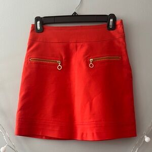 Never worn! Orange Mini Skirt with Gold Accents